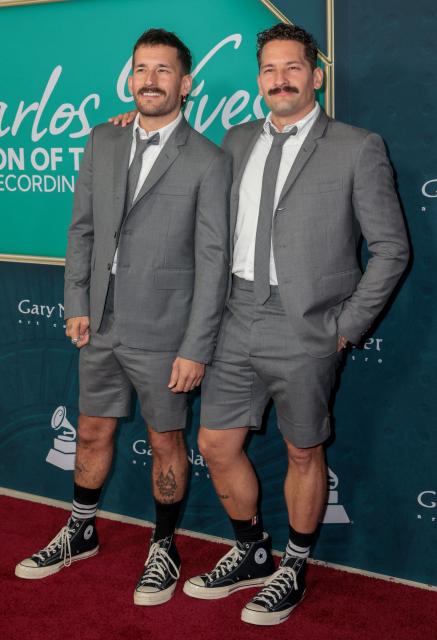 Mauricio Alberto "Mau" Reglero Rodriguez and Ricardo Andres "Ricky" Reglero Rodriguez from Venezuelan duo Mau y Ricky attend the Latin Recording Academy's Person Of The Year gala at the Miami Beach Convention Center in Miami Beach, Florida on November 13, 2024. (Photo by Giorgio Viera / AFP)