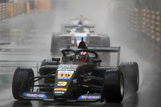 TOM'S Formula Japanese driver Rikuto Kobayashi drives his car during the rain-affected FIA FR World Cup qualification race of the 71st Macau Grand Prix in Macau on November 16, 2024. (Photo by Peter PARKS / AFP)