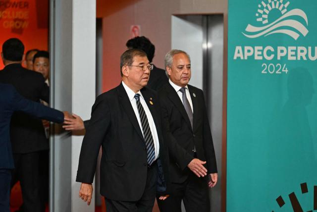 Japan's Prime Minister Shigeru Ishiba arrives at the APEC Economic Leaders’ Meeting (AELM) at the Convention Centre in Lima, on November 16, 2024. (Photo by Luis ACOSTA / AFP)