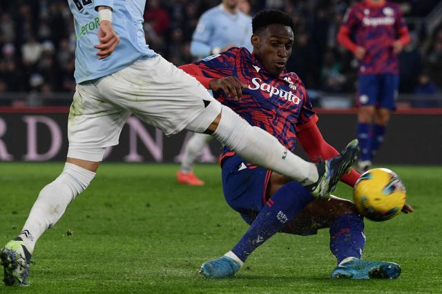 Lazio's Argentine forward #11 Valentin Castellanos fights for the ball with Bologna's Colombian defender #26 Jhon Lucumi (R) during the Italian Serie A football match between Lazio and Bologna at the Olympic Stadium in Rome on November 24, 2024. (Photo by Filippo MONTEFORTE / AFP)