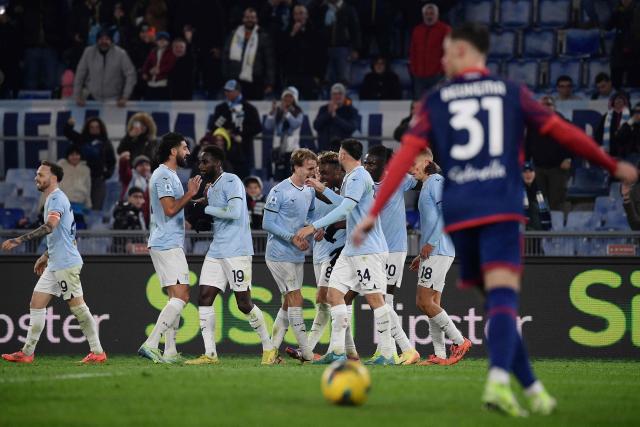 Lazio's Nigerian midfielder #07 Fisayo Dele-Bashiru celebrates scoring his team's third goal  with teammates during the Italian Serie A football match between Lazio and Bologna at the Olympic Stadium in Rome on November 24, 2024. (Photo by Filippo MONTEFORTE / AFP)