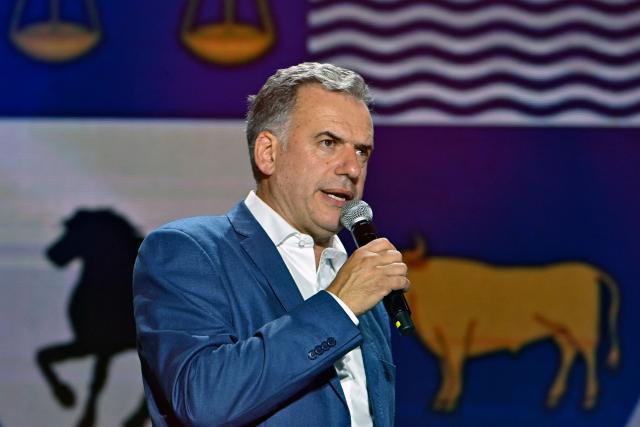 Uruguay's President-elect, Yamandu Orsi, of the Frente Amplio coalition, delivers his victory speech after the presidential runoff election in Montevideo on November 24, 2024. The leftist Yamandъ Orsi, elected president of Uruguay after Sunday's ballot, promised to call ‘again and again’ for national dialogue in a speech to his supporters after the election results showed him as the winner. (Photo by Santiago MAZZAROVICH / AFP)