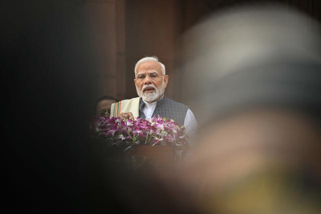 India's Prime Minister Narendra Modi addresses the media upon his arrival on the first day of the winter session of the parliament in New Delhi on November 25, 2024. (Photo by Sajjad HUSSAIN / AFP)