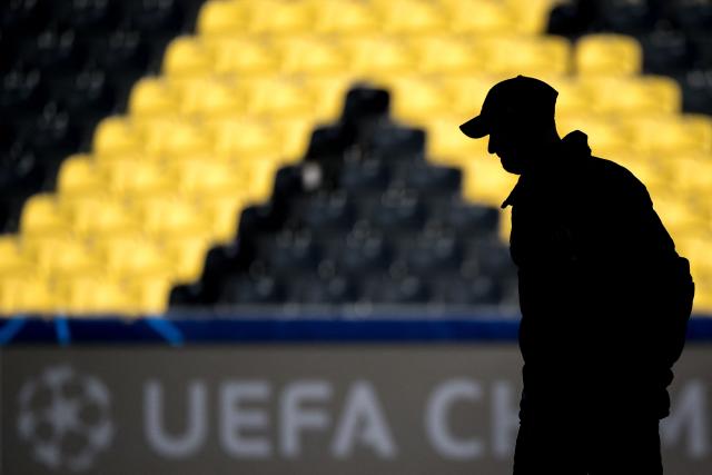 Young Boys' Swiss head coach Joel Magnin is seen silhouetted during a practice session on the eve of the UEFA Champions League football match between Young Boys and Atalanta, at the Wankdorf Stadium in Bern on November 25, 2024. (Photo by Fabrice COFFRINI / AFP)