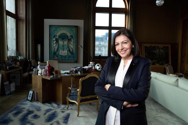 (FILES) The Mayor of Paris Anne Hidalgo, member of the Socialist Party PS and candidate for the upcoming mayoral election in 2020, poses during a photo session in her office at the city hall or Hotel de Ville, in the 4th arrondissement of the French capital, Paris on January 24, 2020. (Photo by JOEL SAGET / AFP)