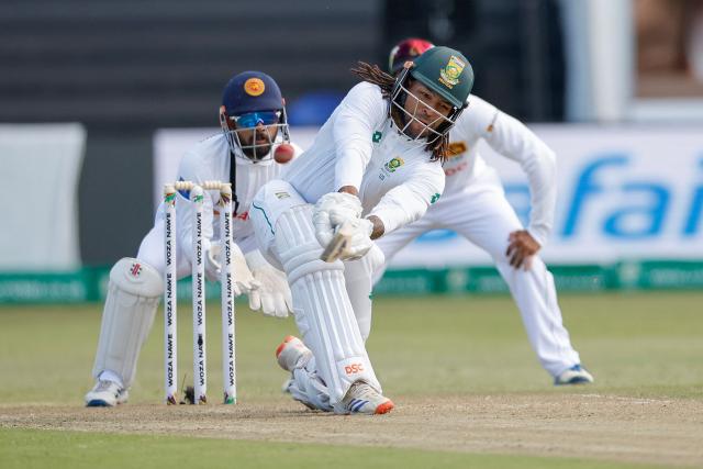 South Africa's Tony de Zorzi (C) plays a shot leading to his dismissal during the second day of the first Test cricket match between South Africa and Sri Lanka at the Kingsmead stadium in Durban on November 28, 2024. (Photo by Phill Magakoe / AFP)