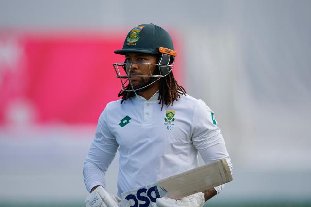 South Africa's Tony de Zorzi walks back to the pavilion after his dismissal during the second day of the first Test cricket match between South Africa and Sri Lanka at the Kingsmead stadium in Durban on November 28, 2024. (Photo by Phill Magakoe / AFP)