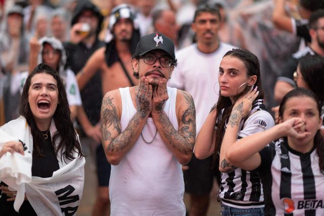 Fans of Atletico Mineiro react during the Copa Libertadores final match between Atletico Mineiro and Botafogo held in Buenos Aires, in Belo Horizonte, Brazil on November 30, 2024. (Photo by Douglas MAGNO / AFP)