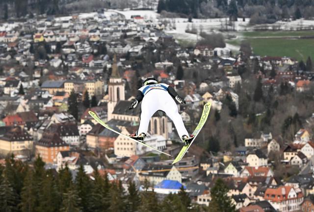 Japan's Ren Nikaido soars through the air during the men’s Large Hill Individual qualification event at the FIS ski jumping World Cup in Titisee-Neustadt, southern Germany, on December 15, 2024. (Photo by THOMAS KIENZLE / AFP)