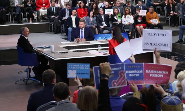 In this pool photograph distributed by the Russian state agency Sputnik, Russia's President Vladimir Putin holds his annual end-of-year press conference in Moscow on December 19, 2024. (Photo by Vyacheslav PROKOFYEV / POOL / AFP)