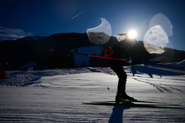 A woman trains ahead of the women's 10km pursuit event of the IBU Biathlon World Cup in Le Grand Bornand near Annecy, southeastern France, on December 21, 2024. (Photo by Olivier CHASSIGNOLE / AFP)