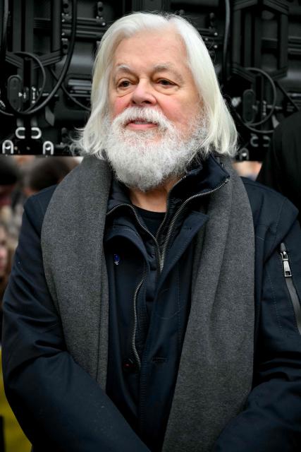 Sea Shepherd Conservation Society founder, anti-whaling activist Paul Watson, attends a rally in his support a day after arriving France following five months in detention in Greenland, at Place de la Republique in Paris, on December 21, 2024. The founder of the Sea Shepherd organisation Paul Watson was released from detention on December 17, 2024, after Denmark refused a Japanese extradition request over a 2010 clash with whalers. (Photo by LOU BENOIST / AFP)