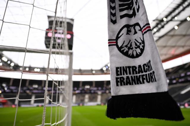 Eintracht's logo is seen on a scarf prior to the German first division Bundesliga football match between Eintracht Frankfurt and 1 FSV Mainz 05 in Frankfurt am Main on December 21, 2024. (Photo by Kirill KUDRYAVTSEV / AFP) / DFL REGULATIONS PROHIBIT ANY USE OF PHOTOGRAPHS AS IMAGE SEQUENCES AND/OR QUASI-VIDEO