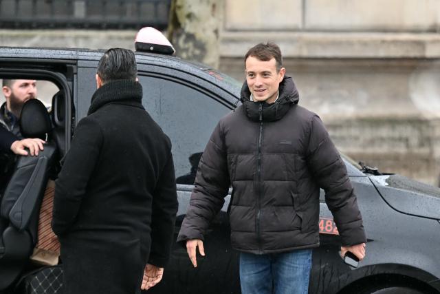 French journalist and writer Hugo Clement  attends a rally in support of Sea Shepherd Conservation Society founder, anti-whaling activist Paul Watson, a day after he arrived in France following five months in detention in Greenland, at Place de la Republique in Paris, on December 21, 2024. The founder of the Sea Shepherd organisation Paul Watson was released from detention on December 17, 2024, after Denmark refused a Japanese extradition request over a 2010 clash with whalers. (Photo by LOU BENOIST / AFP)