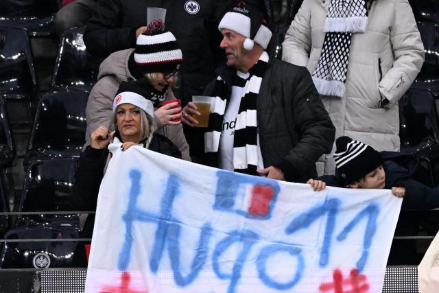 Eintracht's fans react prior the German first division Bundesliga football match between Eintracht Frankfurt and Mainz 05 in Frankfurt on December 21, 2024. (Photo by Kirill KUDRYAVTSEV / AFP) / DFL REGULATIONS PROHIBIT ANY USE OF PHOTOGRAPHS AS IMAGE SEQUENCES AND/OR QUASI-VIDEO