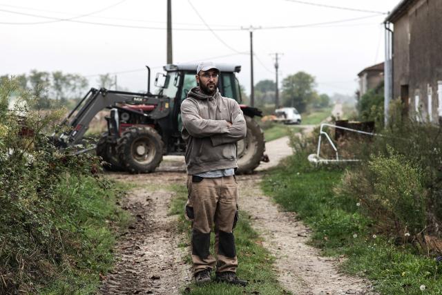 (FILES) Jerome Caze, a 37-year-old farmer who runs a vegetable farm, chicken and pig farm, poses for a photo portrait in Meilhan-sur-Garonne, south-western France on October 3, 2024. Jerome Caze, 37, married with three children, runs a market garden and chicken and pig farm in the Lot-et-Garonne region of France. Since October 2024, he has been telling AFP about his daily life as a “small farmer” in a farming world beset by recurring crises. (Photo by Thibaud MORITZ / AFP)