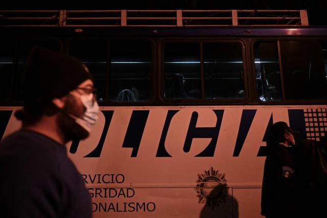 Family members and some of the children who were rescued from the Jewish sect Lev Tahor and taken to a shelter are transferred in a bus by police after they attempted to leave the facility in Guatemala City on December 23, 2024. Relatives of the 160 children who were rescued from the ultra-Orthodox Jewish Lev Tahor sect, under investigation for alleged sexual abuse of minors, gathered outside a shelter in the capital to demand that the authorities return them. The family members, who belong to the sect, stood on a street in front of the headquarters of the Alida Espana Special Care Center for Children, where the children were taken. According to the Attorney General's Office (PGN), the members of the sect "broke into" the center where the minors were being held, "taking away" several of them, but with the help of the police, they "managed to locate and return all of them to safety." (Photo by JOHAN ORDONEZ / AFP)