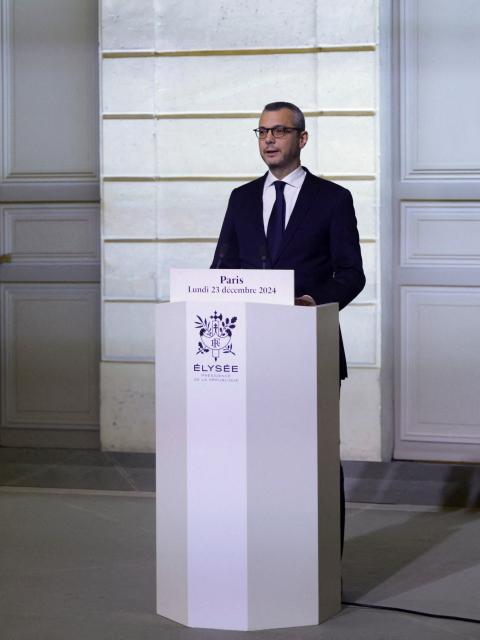 Elysee Palace Secretary-General Alexis Kohler announces the list of newly appointed ministers forming the new French government, at the presidential Elysee Palace in Paris, on December 23, 2024. France's new government was announced on December 23 amid efforts to drag the country out of political crisis. The Elysee announced  the composition of the cabinet of Francois Bayrou, a 73-year-old centrist who was appointed prime minister on December 13 following the fall of a short-lived conservative-led government. (Photo by Abdul Saboor / POOL / AFP)