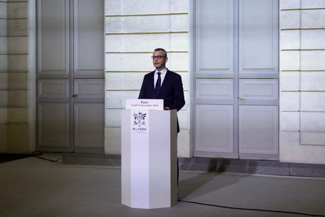 Elysee Palace Secretary-General Alexis Kohler announces the list of newly appointed ministers forming the new French government, at the presidential Elysee Palace in Paris, on December 23, 2024. France's new government was announced on December 23 amid efforts to drag the country out of political crisis. The Elysee announced  the composition of the cabinet of Francois Bayrou, a 73-year-old centrist who was appointed prime minister on December 13 following the fall of a short-lived conservative-led government. (Photo by Abdul Saboor / POOL / AFP)