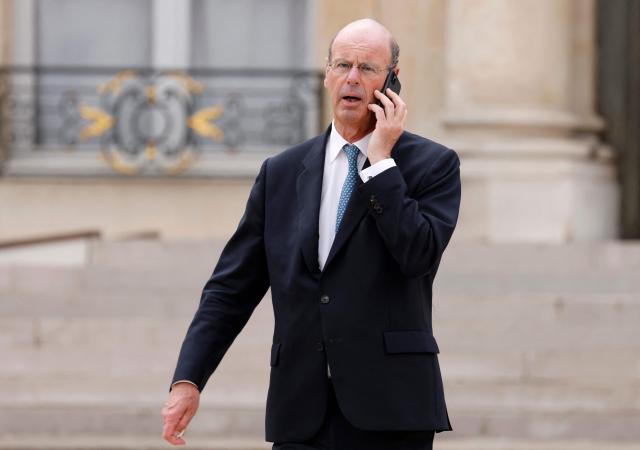 (FILES) Chief Executive Officer (CEO) of French public investment bank La Caisse des Depots (CDC) Eric Lombard leaves the Elysee presidential palace in Paris on May 7, 2022, after the investiture ceremony of Emmanuel Macron as French President, following his re-election last April 24. Eric Lombard was appointed France's Minister for the Economy on December 23, 2024, as France's new government was announced amid efforts to drag the country out of political crisis. The Elysee announced the composition of the cabinet of Francois Bayrou, a 73-year-old centrist who was appointed prime minister on December 13 following the fall of a short-lived conservative-led government. (Photo by Ludovic MARIN / AFP)