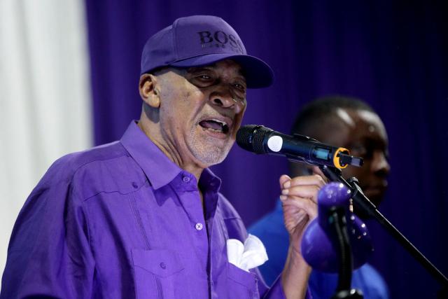 (FILES) Suriname's former President Desi Bouterse speaks during a rally at his NDP party centre, where he asked supporters to calmly wait for the High Court of Justice verdict in his appeals case against the Court Martial, in Paramaribo, on December 16, 2023. Bouterse, the former dictator of Suriname who was a fugitive from justice for the murder of political opponents four decades ago, has died at age 79, the government said on December 25, 2024. (Photo by Ranu Abhelakh / AFP)