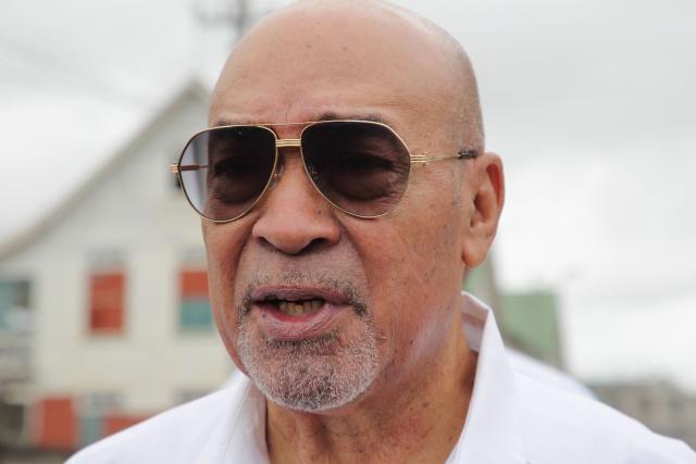 (FILES) Suriname former President Desi Bouterse leaves the High Court of Justice after his appeal case against the Court Martial sentence of 20-year jail for his involvement in the murder of 15 people when he ruled in 1982 during his military government, in Paramaribo on January 5, 2023. Bouterse, the former dictator of Suriname who was a fugitive from justice for the murder of political opponents four decades ago, has died at age 79, the government said on December 25, 2024. (Photo by Ranu Abhelakh / AFP)