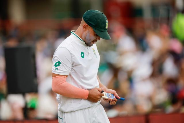 paterson signs memorabilia for a supporter during the first day of the first cricket Test match between South Africa and Pakistan at SuperSport Park in Centurion on December 26, 2024. (Photo by PHILL MAGAKOE / AFP)