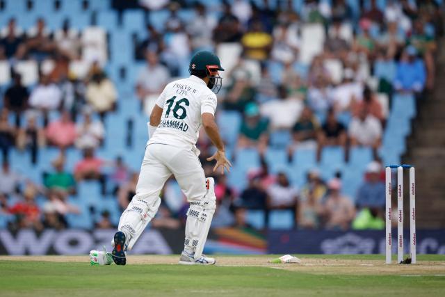 Pakistan's Mohammad Rizwan reacts after a ball hit his right hand during a delivery during the first day of the first cricket Test match between South Africa and Pakistan at SuperSport Park in Centurion on December 26, 2024. (Photo by PHILL MAGAKOE / AFP)