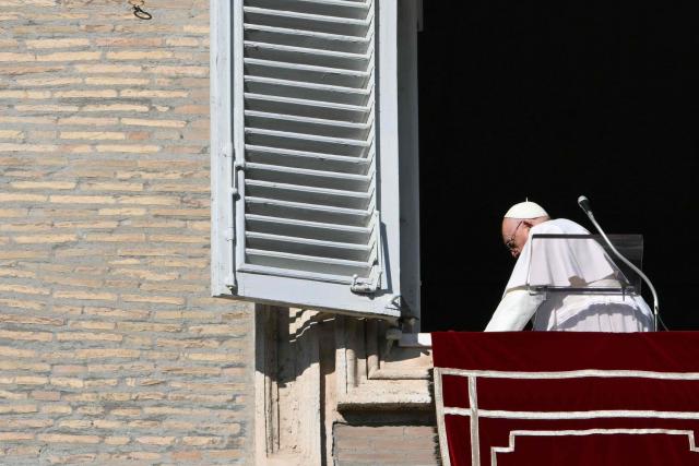 Pope Francis leaves the window of the apostolic palace overlooking St. Peter's square at the end of the Angelus prayer on December 26, 2024 in The Vatican. (Photo by Alberto PIZZOLI / AFP)