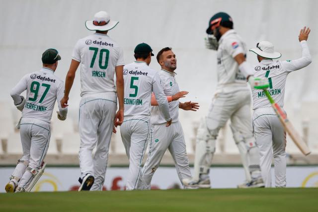 South Africa's Dane Paterson (3rd R) celebrates with teammates after the dismissal of Pakistan's Mohammad Rizwan (2nd R) during the first day of the first cricket Test match between South Africa and Pakistan at SuperSport Park in Centurion on December 26, 2024. (Photo by PHILL MAGAKOE / AFP)