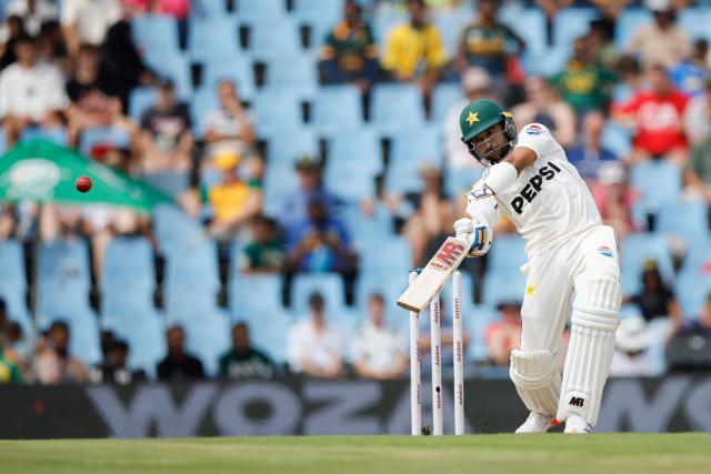 Pakistan's Khurram Shahzad watches the ball after playing a shot during the first day of the first cricket Test match between South Africa and Pakistan at SuperSport Park in Centurion on December 26, 2024. (Photo by PHILL MAGAKOE / AFP)