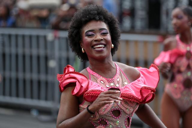 A salsa dancer performs during a parade in the framework of the Fair of Cali at the Salsodromo in Cali, Colombia, on December 25, 2024. (Photo by Lusef ROJAS / AFP)