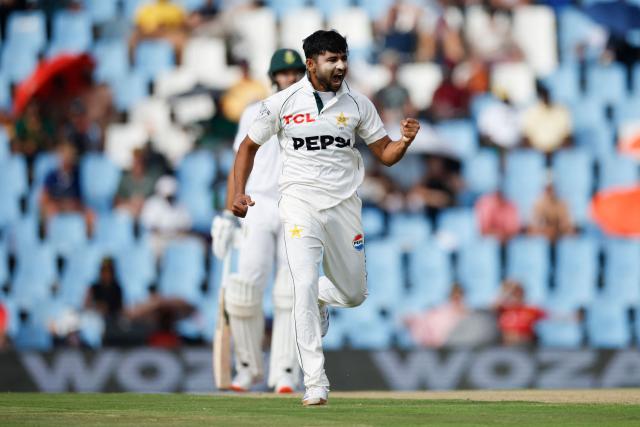 Pakistan's Khurram Shahzad celebrates after the dismissal of South Africa's Ryan Rickelton (unseen) during the first day of the first cricket Test match between South Africa and Pakistan at SuperSport Park in Centurion on December 26, 2024. (Photo by PHILL MAGAKOE / AFP)