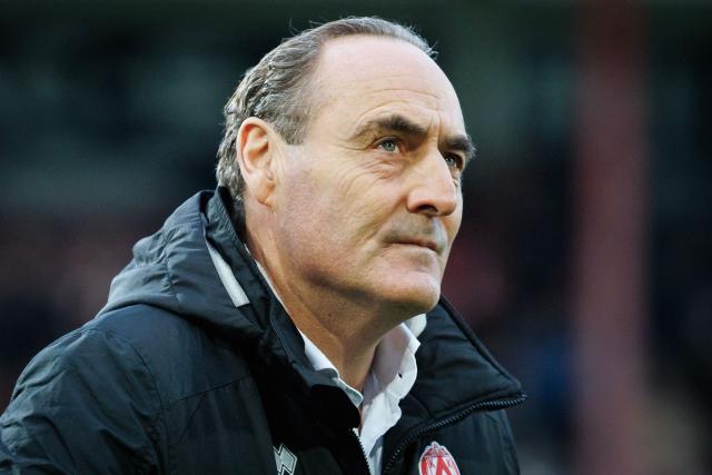 Kortrijk's Belgian head coach Yves Vanderhaeghe looks on during the Belgian "Pro League" First Division football match between KV Kortrijk and Sporting Charleroi at the Golden Spurs Stadium in Kortrijk on December 26, 2024. (Photo by KURT DESPLENTER / BELGA / AFP) / Belgium OUT