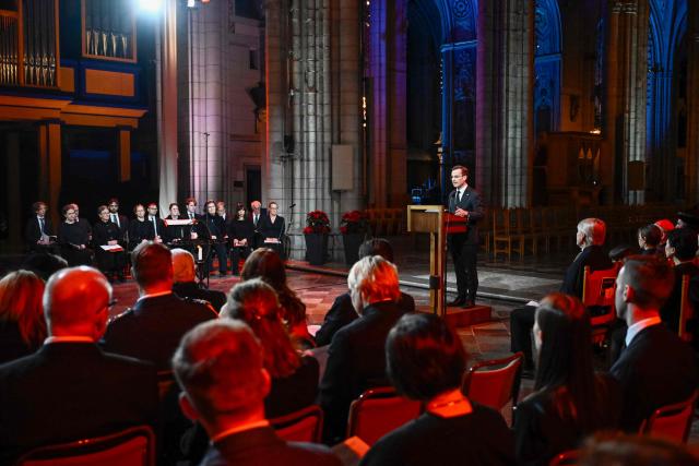 Sweden's Prime Minister Ulf Kristersson gives a speech during a memorial service for the victims of the 2004 tsunami in the Indian Ocean, at the Cathedral in Uppsala, on December 26, 2024. (Photo by Christine OLSSON / TT News Agency / AFP) / Sweden OUT