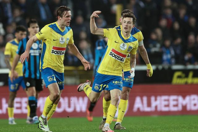 Westerlo's US forward #18 Griffin Yow (R) celebrates after scoring a goal during a Belgian Pro League first division football match between Club Brugge KV and KVC Westerlo, in Brugge, on December 26, 2024. (Photo by BRUNO FAHY / Belga / AFP) / Belgium OUT