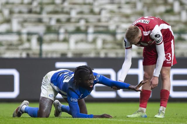 Genk's Nigerian forward #99 Tolu Toluwalase Arokodare (L) reacts during the Belgian "Pro League" First Division football match between Royal Antwerp FC and KRC Genk at the Bosuilstadion, in Antwerp on December 26, 2024. (Photo by KRISTOF VAN ACCOM / BELGA / AFP) / Belgium OUT