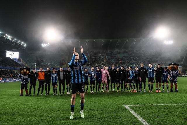 Club's Belgian defender #41 Hugo Siquet (C) celebrates with teammates at the end of the Belgian Pro League first division football match between Club Brugge KV and KVC Westerlo, in Brugge, on December 26, 2024. (Photo by BRUNO FAHY / Belga / AFP) / Belgium OUT