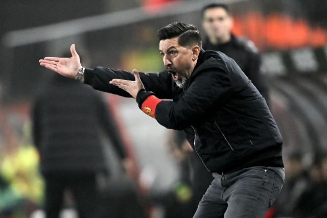 Mechelen's Kosovan-Albanian head coach Besnik Hasi shouts instructions to his players from the touchline during a Belgian Pro League football match between KV Mechelen and Standard de Liege, at the AFAS stadium in Mechelen on December 26, 2024. (Photo by Johan Eyckens / Belga / AFP) / Belgium OUT