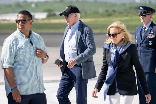 US President Joe Biden and First Lady Jill Biden disembark from Air Force One upon arrival at Henry E. Rohlsen Airport in Christiansted, St. Croix, on the US Virgin Islands, on December 26, 2024, as they arrive for a week-long visit. (Photo by SAUL LOEB / AFP)