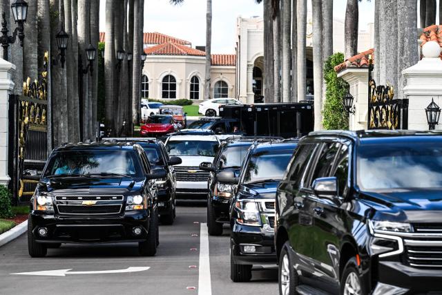 The motorcade carrying US President-elect Donald Trump leaves Trump International Golf Club in West Palm Beach, Florida on December 26, 2024. (Photo by CHANDAN KHANNA / AFP)