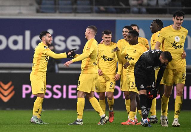 Union's players celebrate their team's second goal during a Belgian Pro League football match between KAA Gent and Royale Union SG at the Planet Group Arena in Ghent on December 26, 2024. (Photo by JOHN THYS / Belga / AFP) / Belgium OUT