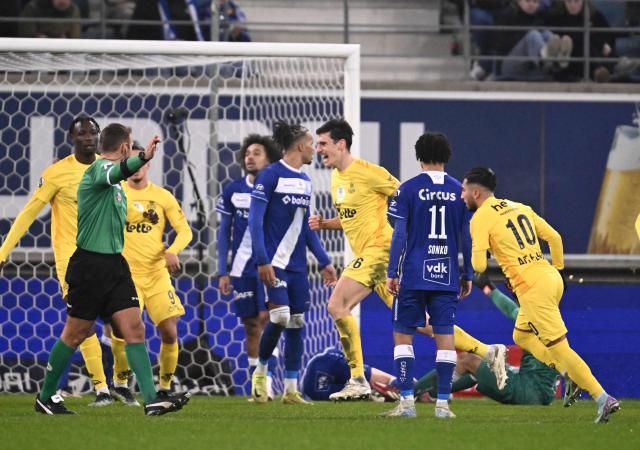 Union's British defender #26 Ross Sykes (C) celebrates scoring his team's second goal during a Belgian Pro League football match between KAA Gent and Royale Union SG at the Planet Group Arena in Ghent on December 26, 2024. (Photo by JOHN THYS / Belga / AFP) / Belgium OUT