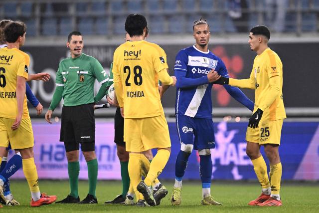 Gent's and Union's players greet each others after a Belgian Pro League football match between KAA Gent and Royale Union SG at the Planet Group Arena in Ghent on December 26, 2024. (Photo by JOHN THYS / Belga / AFP) / Belgium OUT