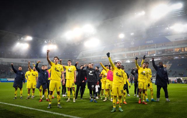 Union's players celebrate after winning the Belgian Pro League football match between KAA Gent and Royale Union SG at the Planet Group Arena in Ghent on December 26, 2024. (Photo by VIRGINIE LEFOUR / Belga / AFP) / Belgium OUT