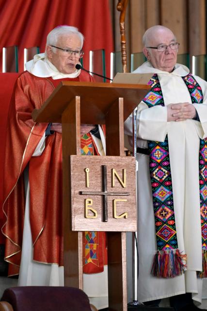 Bishop Raul Vera (L) and priest Gonzalo Ituarte officiate a mass for relatives of the Ayotzinapa victims inside the Basilica of Our Lady of Guadalupe during a pilgrimage by relatives of the victims to demand justice in the case of the Ayotzinapa missing students in Mexico City on December 26, 2024. 26 September marked 10 years since the enforced disappearance of 43 students from the Ayotzinapa Rural Normal School. (Photo by ALFREDO ESTRELLA / AFP)