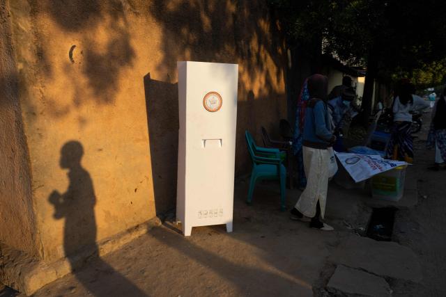 TOPSHOT - A polling booth is seen as electoral officials prepare a voting station in N'Djamena on December 29, 2024 at the beginnning of the local, provincial and legislative elections. Chad goes to the polls Sunday for legislative, provincial and local elections that are presented by the government as the last stage of a political transition after three years of military rule, but are being boycotted by the opposition. The boycott leaves the field open to candidates aligned with Marshal Mahamat Idriss Itno, who was brought to power by the military in 2021 and then legitimised in a presidential election last May that opposition candidates denounced as fraudulent. (Photo by Joris Bolomey / AFP)