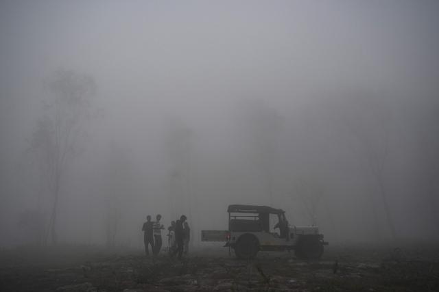 Tourists enjoy the weather during a wintry day in Yercaud, a hill station in India's Tamil Nadu state, on December 30, 2024. (Photo by R.Satish BABU / AFP)