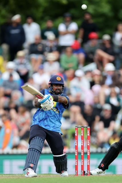 Sri Lanka's captain Charith Asalanka plays a shot during the third Twenty20 cricket match between New Zealand and Sri Lanka at Saxton Oval in Nelson on January 2, 2025. (Photo by Marty MELVILLE / AFP)