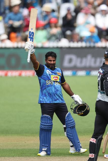 Sri Lanka's Kusal Perera celebrates 100 runs during the third Twenty20 cricket match between New Zealand and Sri Lanka at Saxton Oval in Nelson on January 2, 2025. (Photo by Marty MELVILLE / AFP)